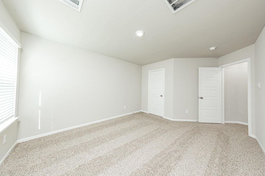 Spacious, unfurnished interior of a new home in Mackenzie Creek, Conroe (Image 16). Spacious, unfurnished interior of a new home in Mackenzie Creek, Conroe (Image 16).