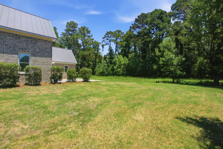 Exterior details and patio area of a home in , Johns Island (Image 34).
