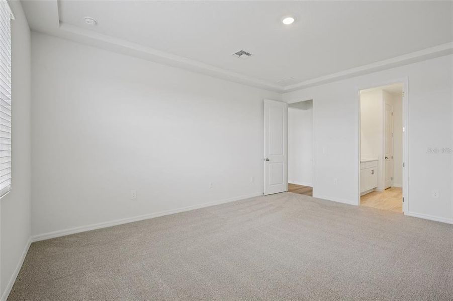 Spacious, unfurnished interior of a new home in Coasterra - Reserve Series, Palmetto (Image 39).