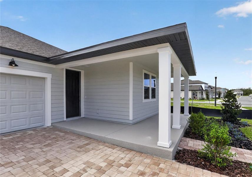 Exterior details and patio area of a home in Trailside, Mount Dora (Image 4). Exterior details and patio area of a home in Trailside, Mount Dora (Image 4).
