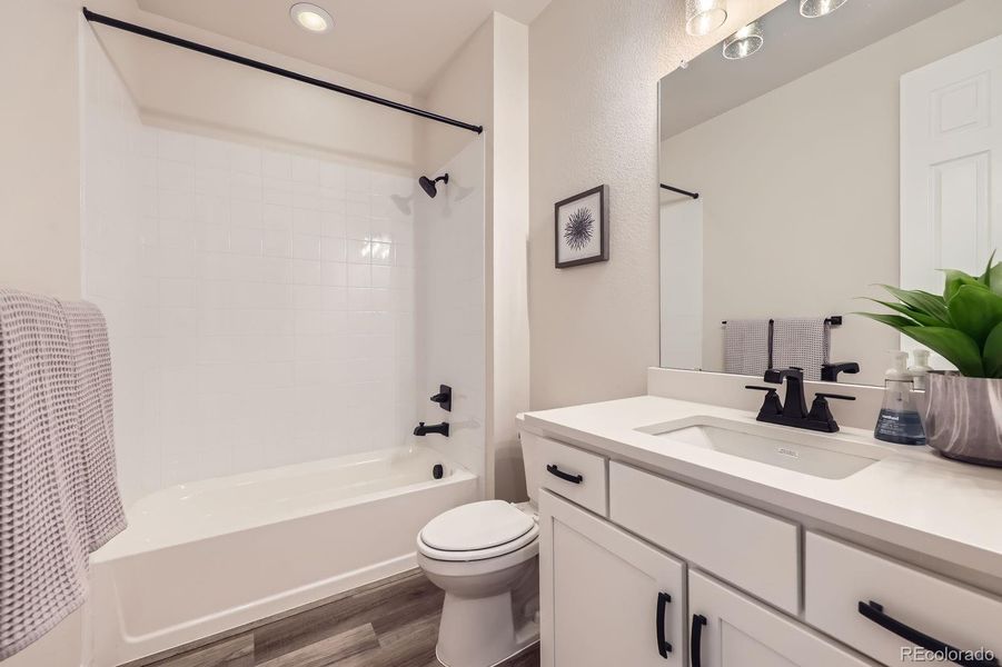 Furnished interior view inside a new home in Haskins Station, Arvada (Image 18).
