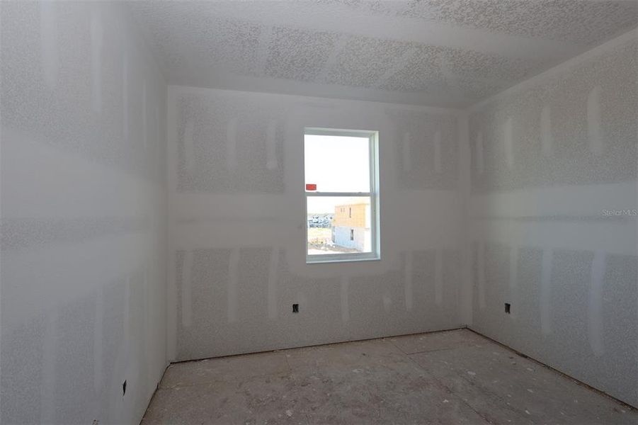 In-progress construction of a new home in Lake Star at Ovation, Winter Garden, FL (Image 24).