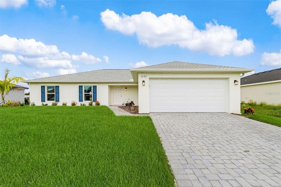 Front exterior of a new home in , Cape Coral, FL, highlighting curb appeal (Image 2). Front exterior of a new home in , Cape Coral, FL, highlighting curb appeal (Image 2).