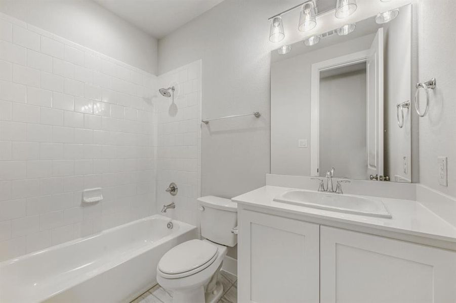 Full bathroom featuring vanity and bathtub / shower combination