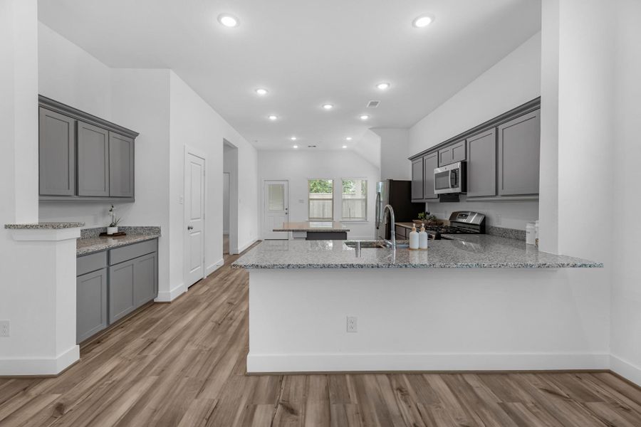 This kitchen is not only a functional space but also has ample storage. Whether you're a seasoned chef or just love to gather and enjoy good food, this kitchen is a dream come true.