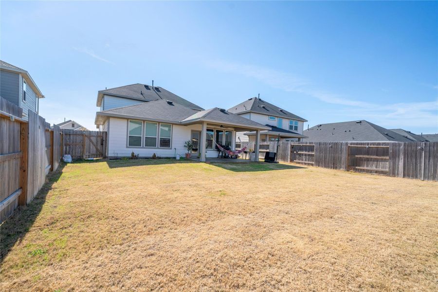 Exterior details and patio area of a home in Mason Woods, Cypress (Image 29). Exterior details and patio area of a home in Mason Woods, Cypress (Image 29).