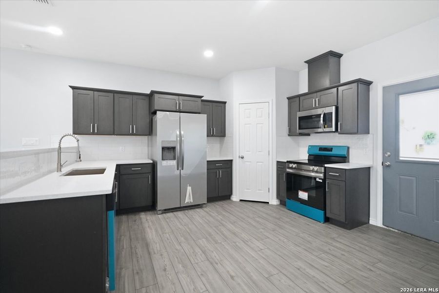 Furnished interior view inside a new home in , Beeville (Image 6).