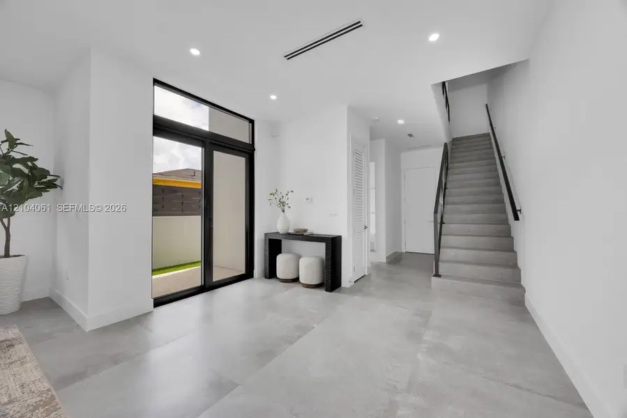 Furnished interior view inside a new home in , Miami (Image 13).