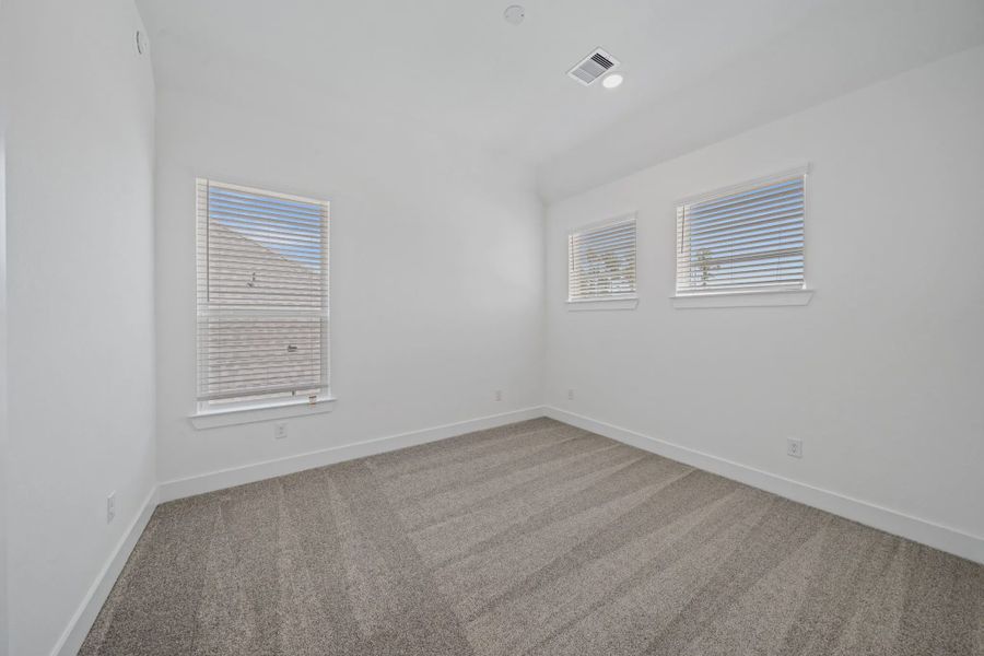 Representative unfurnished interior of a home built from the Waterloo by Chesmar Homes in Attwater 65's, Waller (Image 17).