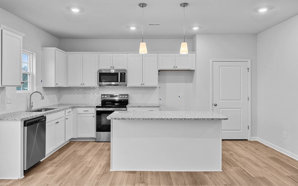 Furnished interior view inside a new home in Fieldstone, Lexington (Image 7).