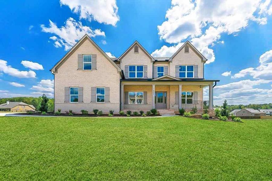 Front exterior of a new home in , Watkinsville, GA, highlighting curb appeal (Image 1).