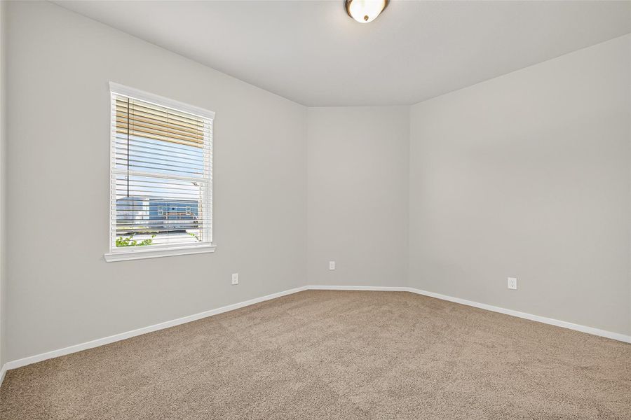 Spacious, unfurnished interior of a new home in Sunterra, Katy (Image 38).