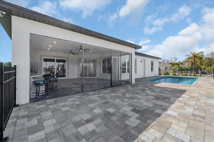 Exterior details and patio area of a home in , Port Charlotte (Image 27).