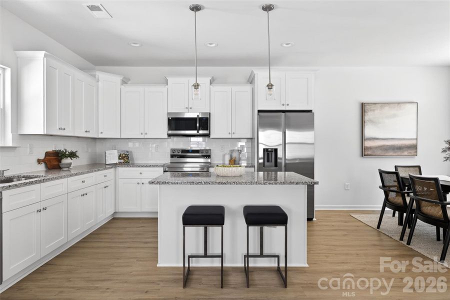 Furnished interior view inside a new home in , Charlotte (Image 13).