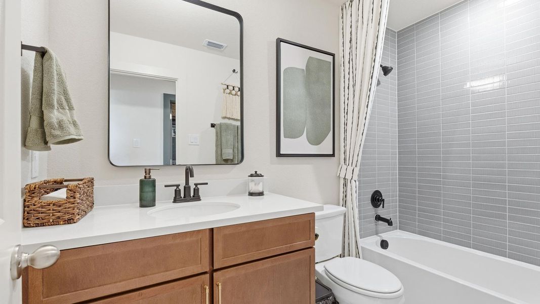 Model home photos of similar floorplans, not pictures of actual home.