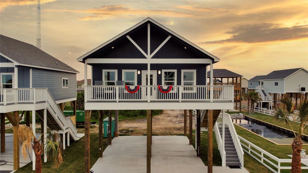 Front exterior of a new home in , Crystal Beach, TX, highlighting curb appeal (Image 27).