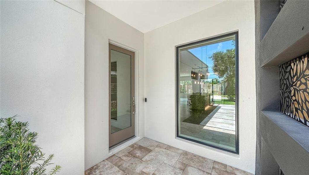 Exterior details and patio area of a home in , Sarasota (Image 30).