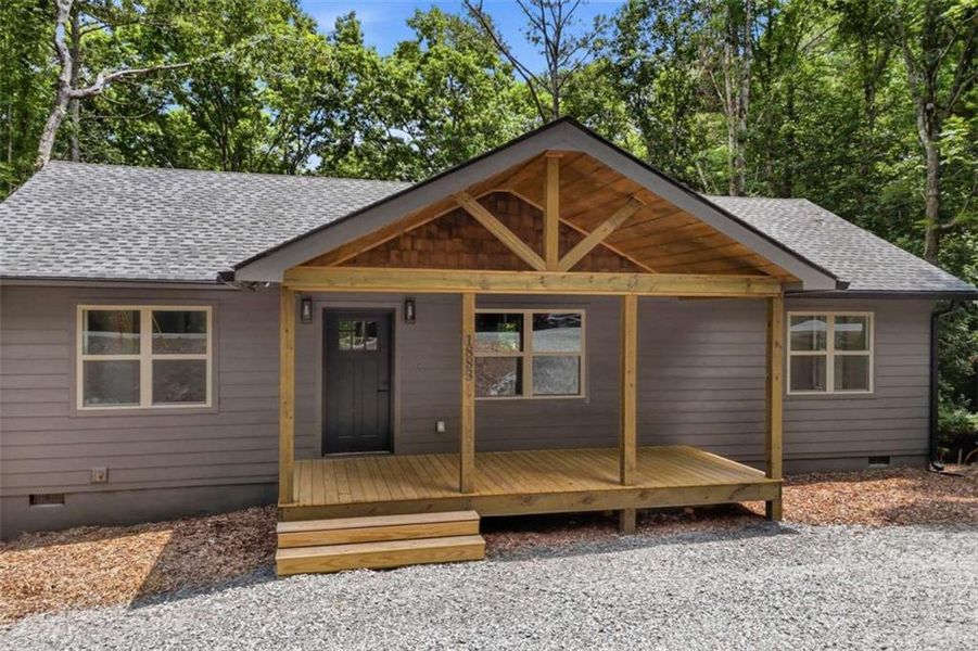 Exterior details and patio area of a home in , Ellijay (Image 24).