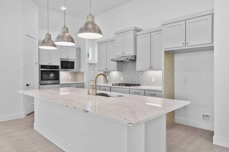 Representative furnished interior of a home built from the Summerton by Chesmar Homes in Grange, Katy (Image 5).