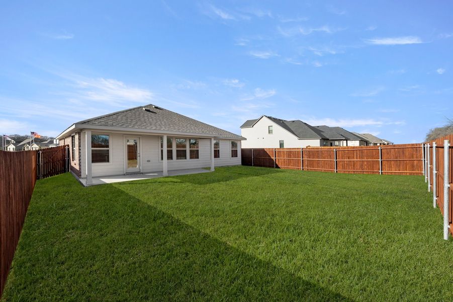 Front exterior of a new home in Belmont, Aubrey, TX, highlighting curb appeal (Image 27). Front exterior of a new home in Belmont, Aubrey, TX, highlighting curb appeal (Image 27).