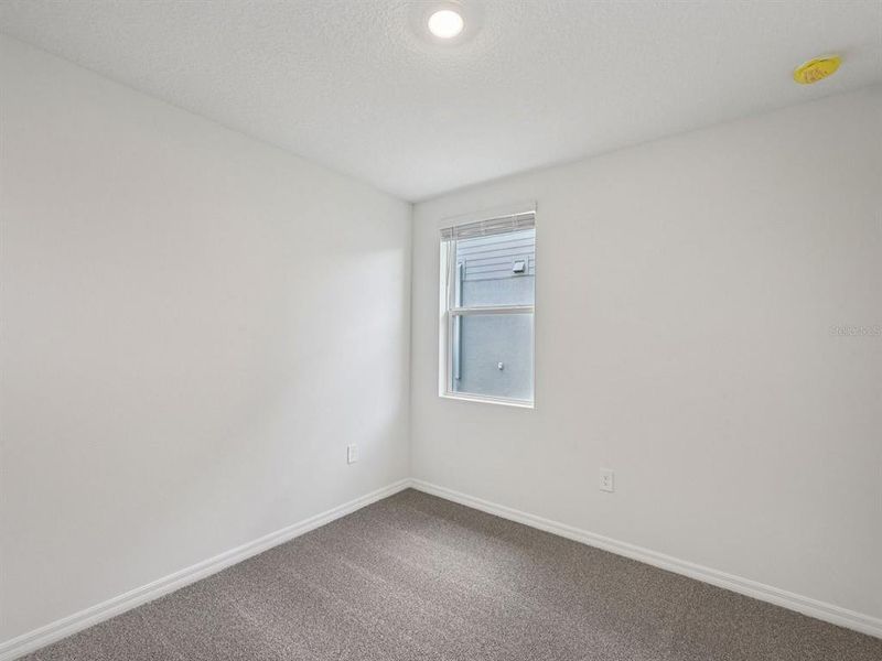 Spacious, unfurnished interior of a new home in Coasterra - Premier Series, Palmetto (Image 14).