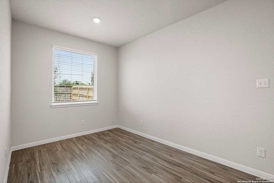 Spacious, unfurnished interior of a new home in Melissa Ranch, San Antonio (Image 9).