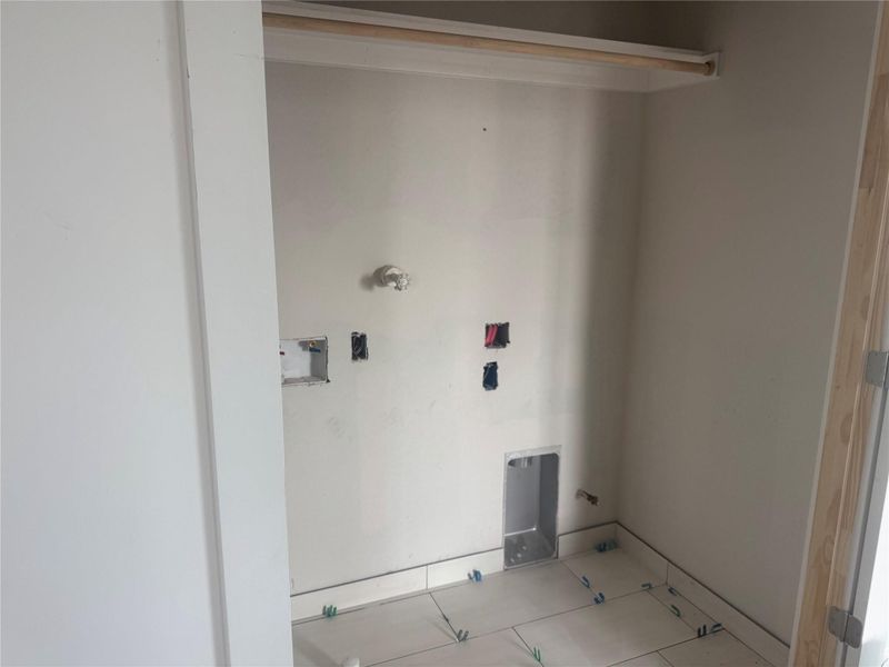 Side by side washer dryer area