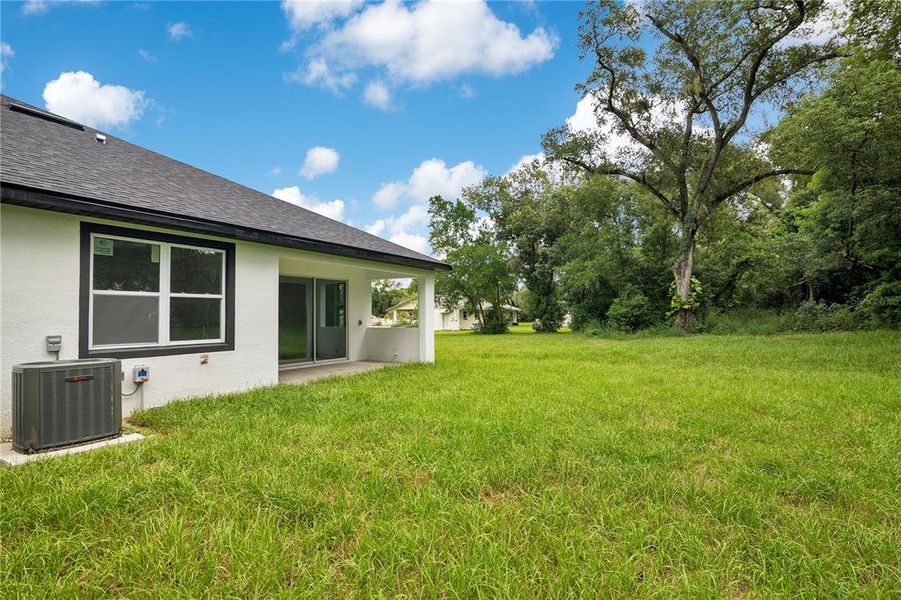 Front exterior of a new home in , Apopka, FL, highlighting curb appeal (Image 2).
