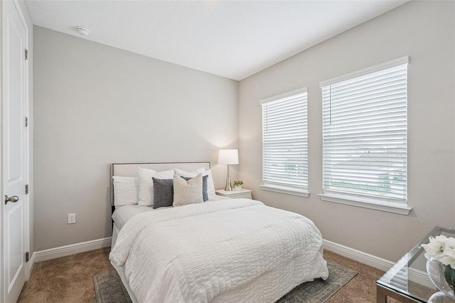 Furnished interior view inside a new home in Laureate Park, Orlando (Image 13).