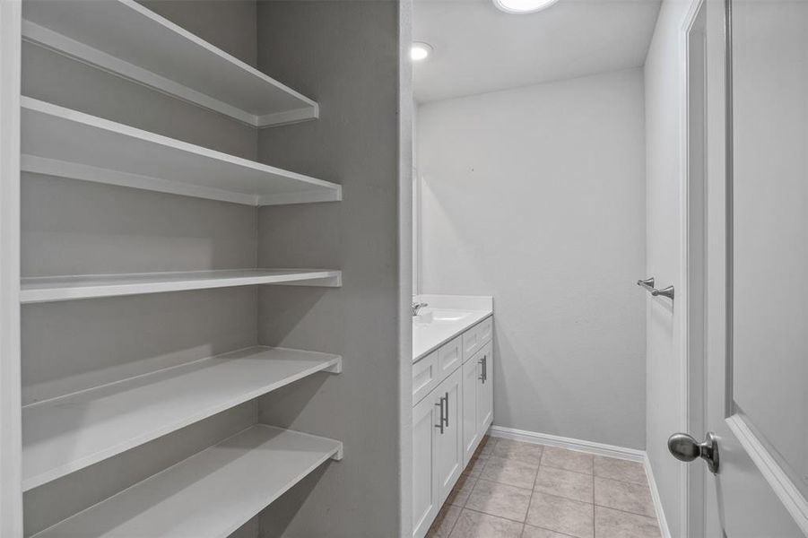 Spacious second bathroom with separated shower and sink