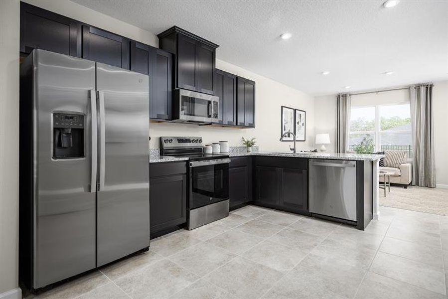 Representative furnished interior of a home built from the Flamingo Exterior Home by Ryan Homes in Edison Pointe, Daytona Beach (Image 2).