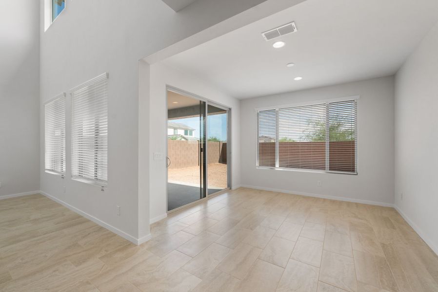 Spacious, unfurnished interior of a new home in Blossom Rock, Apache Junction (Image 29).