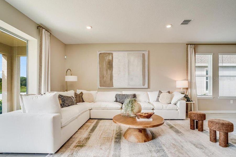 Furnished interior view inside a new home in Center Lake Ranch Community Group Page, St. Cloud (Image 9).