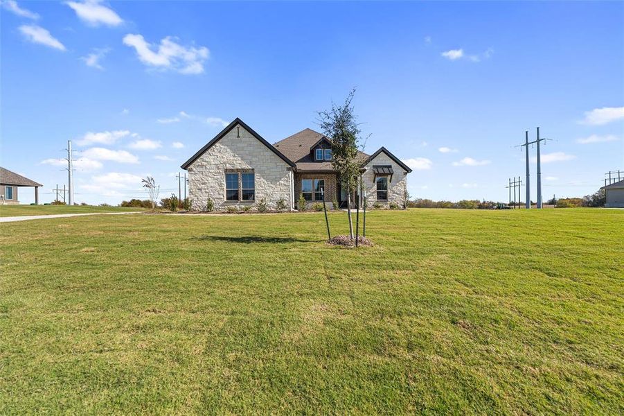 Front exterior of a new home in Parker Heights, Valley View, TX, highlighting curb appeal (Image 24). Front exterior of a new home in Parker Heights, Valley View, TX, highlighting curb appeal (Image 24).
