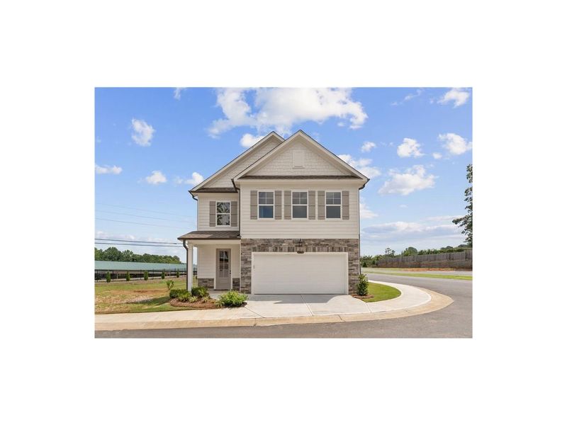 Front exterior of a new home in The Village at Shallowford, Kennesaw, GA, highlighting curb appeal (Image 1). Front exterior of a new home in The Village at Shallowford, Kennesaw, GA, highlighting curb appeal (Image 1).