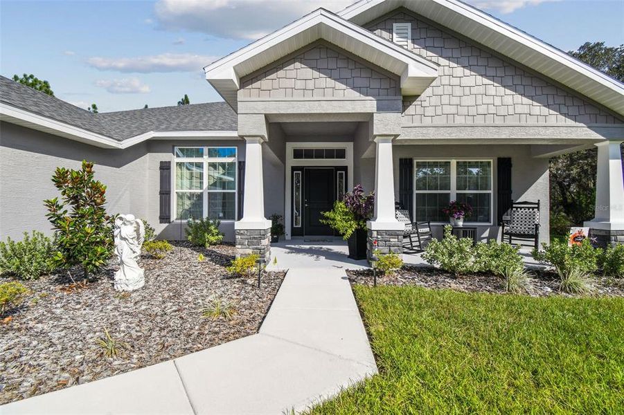 Front exterior of a new home in Sugarmill Woods, Homosassa, FL, highlighting curb appeal (Image 28).