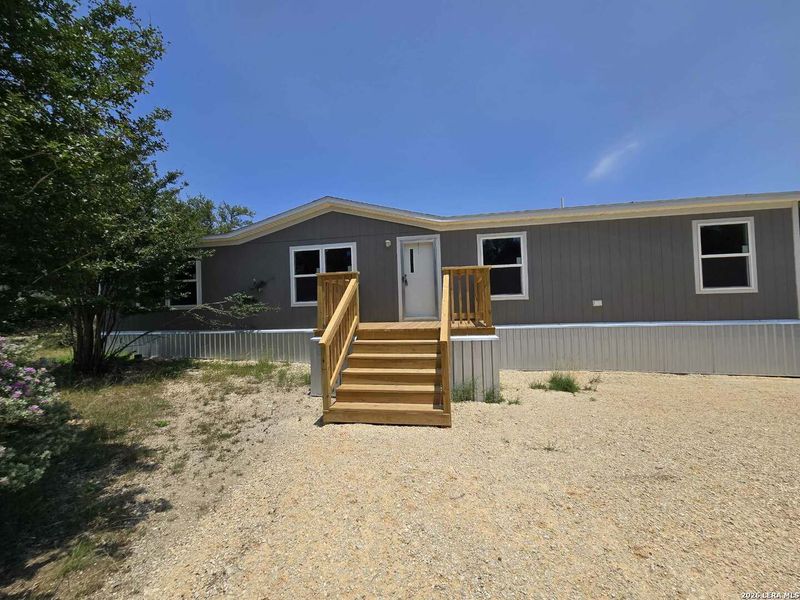 Exterior details and patio area of a home in , Canyon Lake (Image 10).