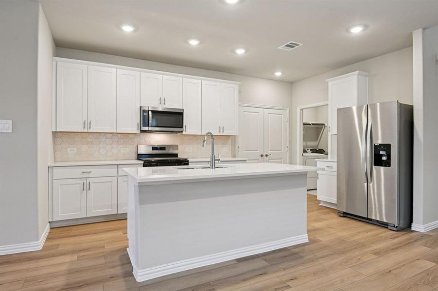 Photo is not of the actual home, but is an inspirational photo of builder’s model home and may depict options, furnishings, and/or decorator features that are not included.