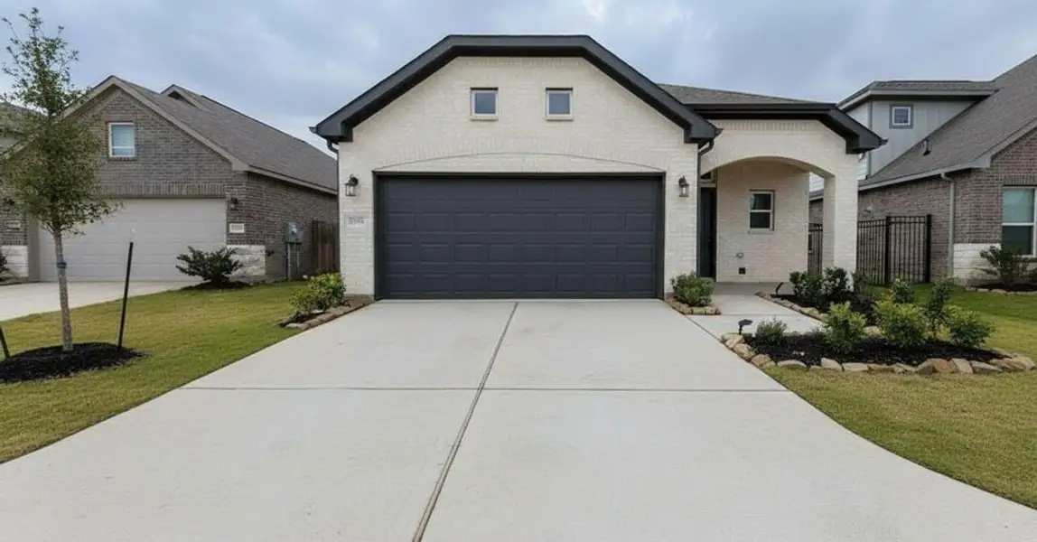 Front exterior of a new home in Creekhaven, Iowa Colony, TX, highlighting curb appeal (Image 1). Front exterior of a new home in Creekhaven, Iowa Colony, TX, highlighting curb appeal (Image 1).