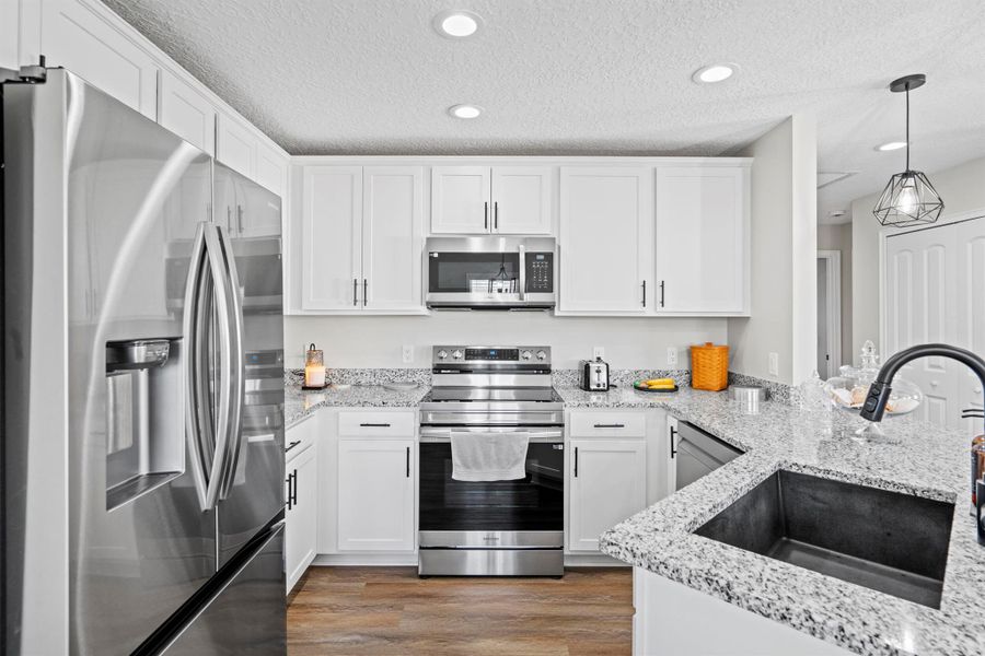 Furnished interior view inside a new home in , Okeechobee (Image 19).