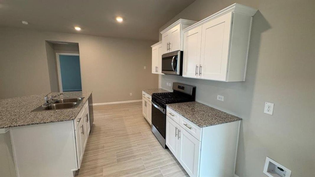 Furnished interior view inside a new home in Highlands at Chapel Creek, Fort Worth (Image 6).