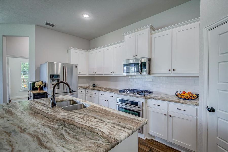 Furnished interior view inside a new home in , Lone Oak (Image 3). Furnished interior view inside a new home in , Lone Oak (Image 3).