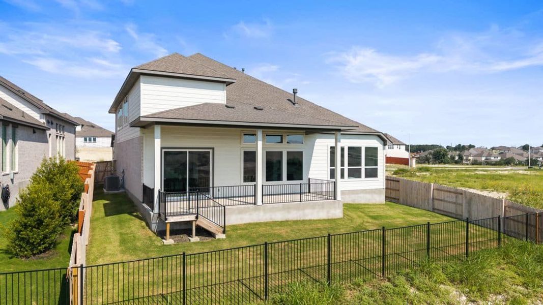 Exterior details and patio area of a home in Lariat, Liberty Hill (Image 36).