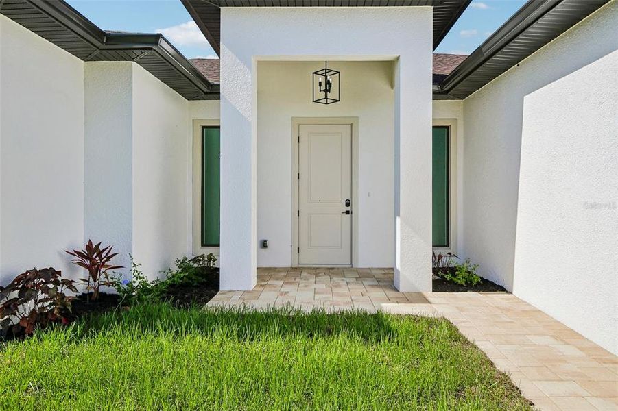Exterior details and patio area of a home in , North Port (Image 22).