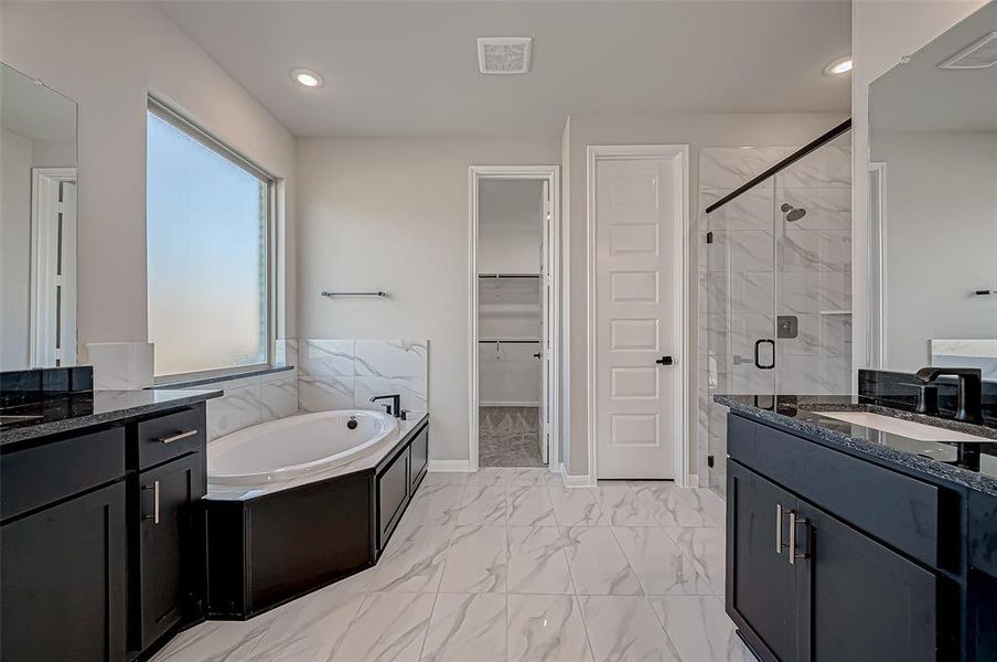 Primary ensuite A includes a soaking tub for ultimate relaxation