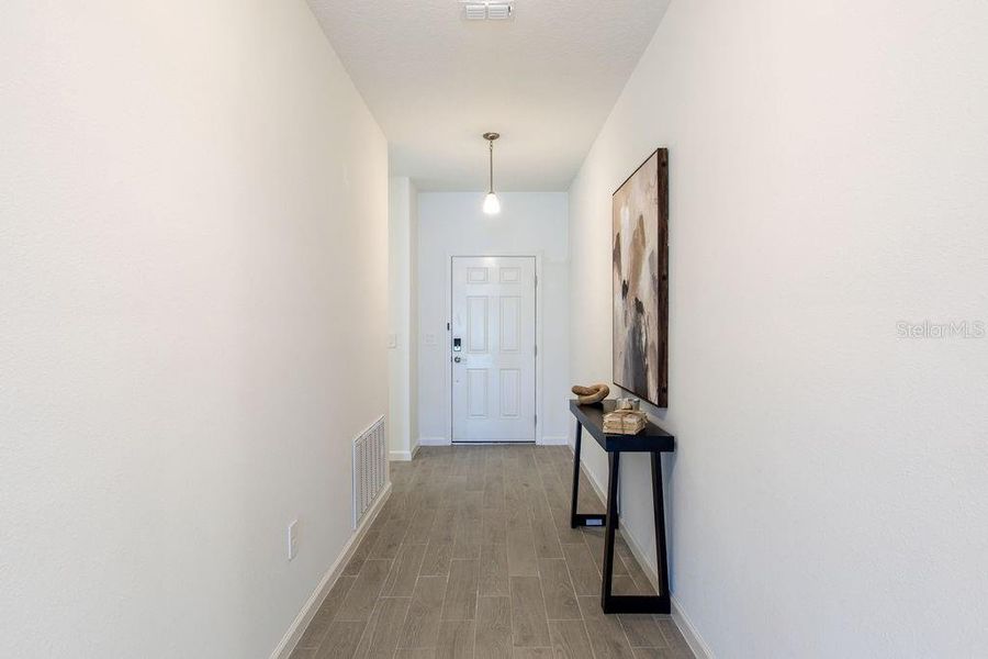 Furnished interior view inside a new home in Trailhead Landing, Alachua (Image 12).
