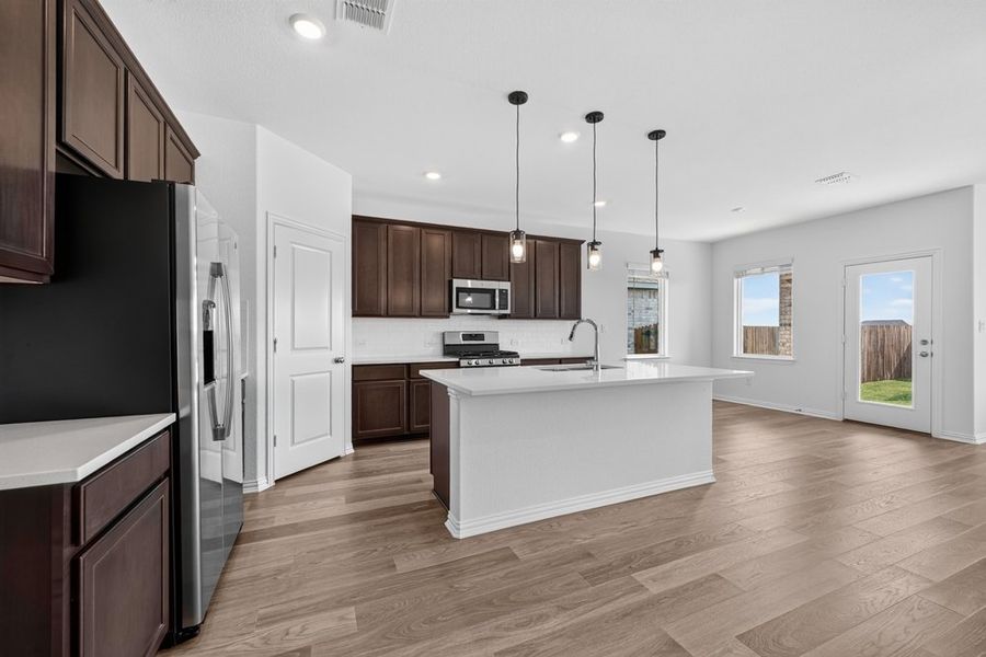 Furnished interior view inside a new home in Parks at Foster Crossing, Anna (Image 8).
