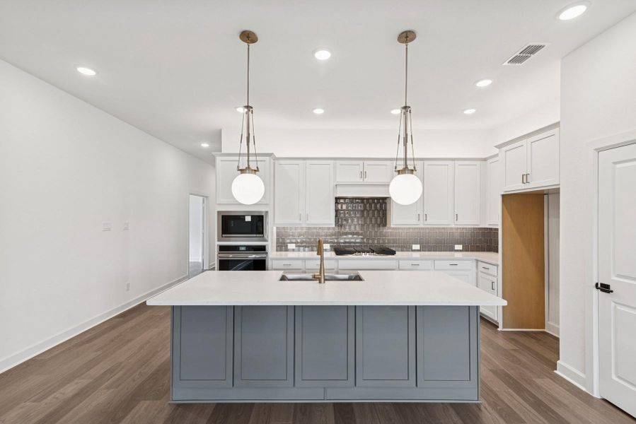 Furnished interior view inside a new home in Meridiana 55' Homesites, Manvel (Image 4).