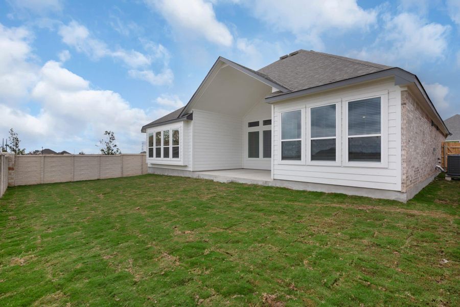 Exterior details and patio area of a home in The Grove at Blackhawk, Pflugerville (Image 28).