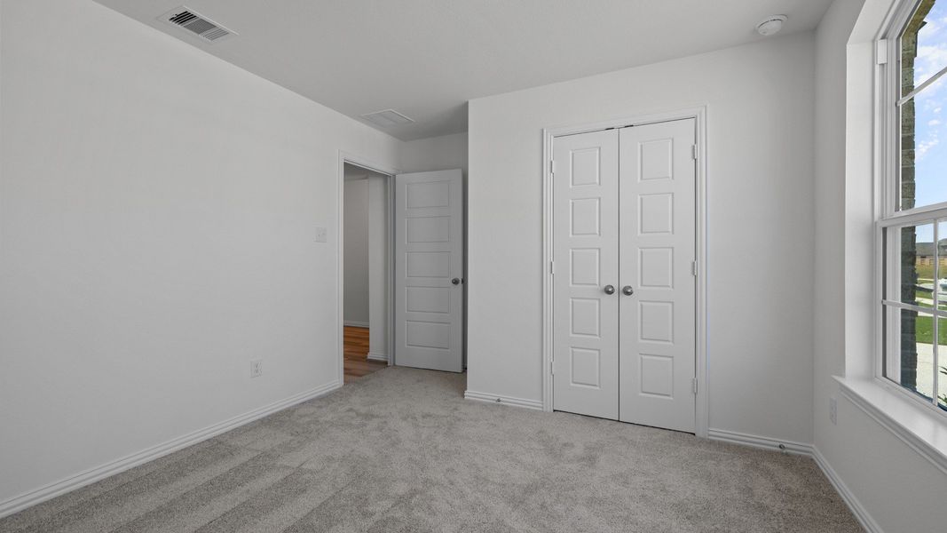 Furnished interior view inside a new home in Oakwood Estates, Waller (Image 8).